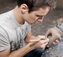 Art Studuent making a clay pot
