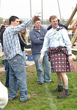 Dr. Brice and history students demonstrate trebuchet.