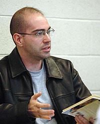 Student taking part in discussion.