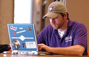 Student working on laptop computer