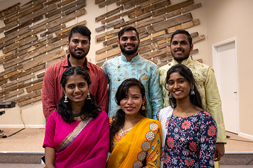 posed photo of six indian students