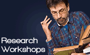 Image of a man researching some books with the text research workshops.