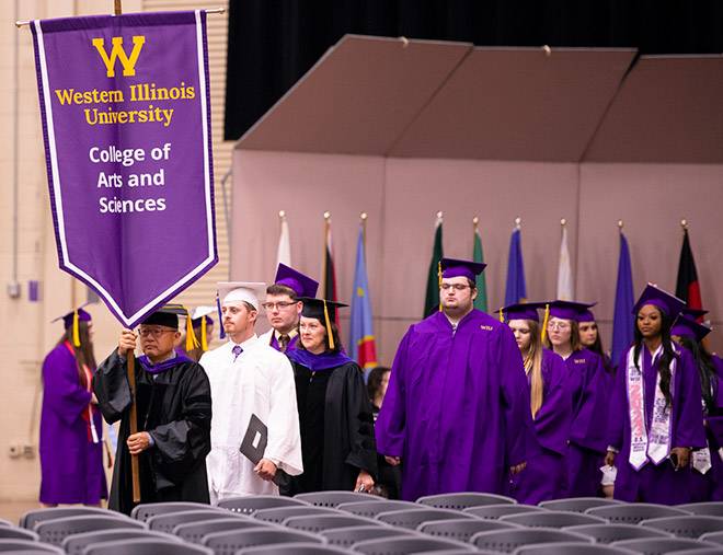 Faculty and students marching at commencement