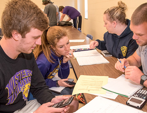 students in class working