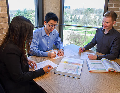 students studying in the library