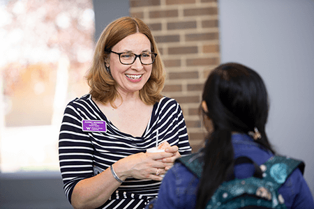 Student being greeted at the Career Center