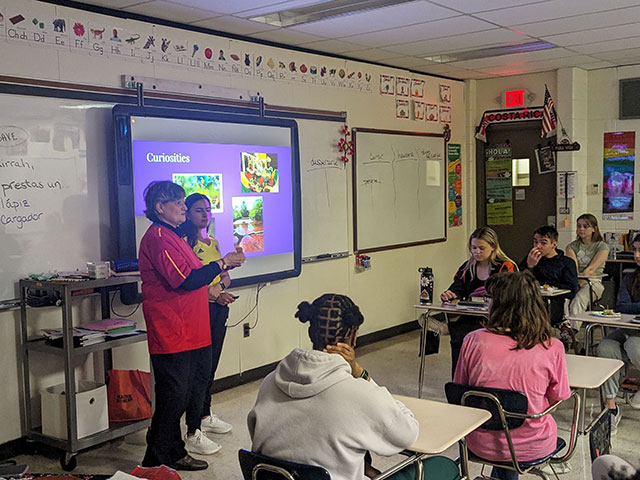 WIU student presenting to HS classroom