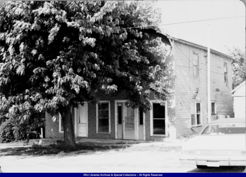 The former Eldon James Drug Store building in Prairie City, photographed in 1975; it housed Decker Press beginning in 1937.