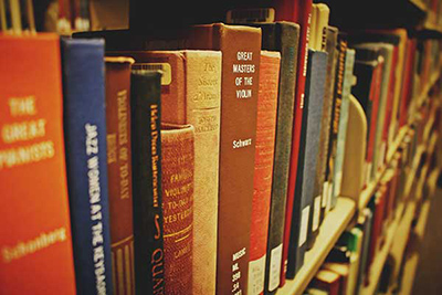 Books on bookshelf in library