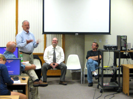 Photo from the whistleblower panel discussion, Ray Long talking.