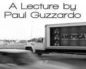 Image of a blurry car in the foreground and a moving truck in the background with the text A Lecture by Paul Guzzardo.