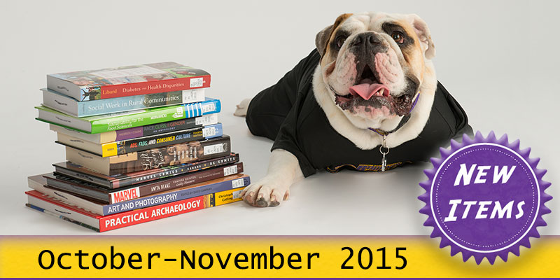 Photo of Col. Rock mascot with books with the text New October - November 2015.