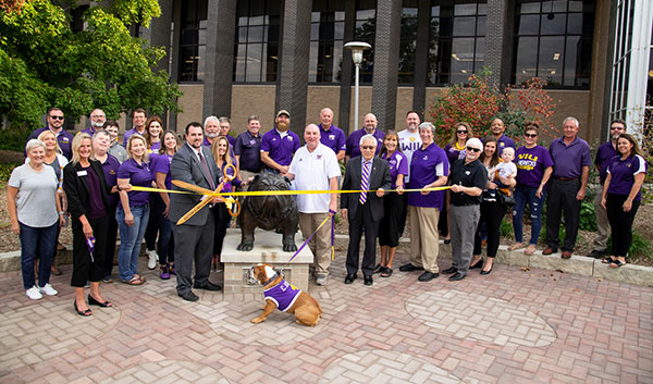 WIU Administration and Mascot Memorial Supporters cutting ribbon for Mascot Memorial Statue/Plaza