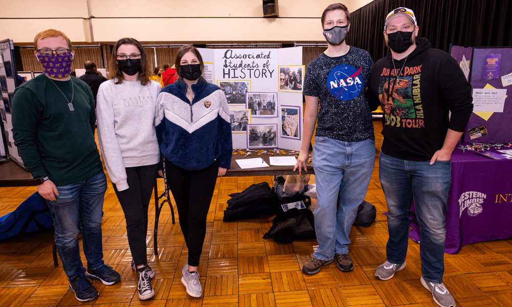Photo of Associated Students of History's table and members
